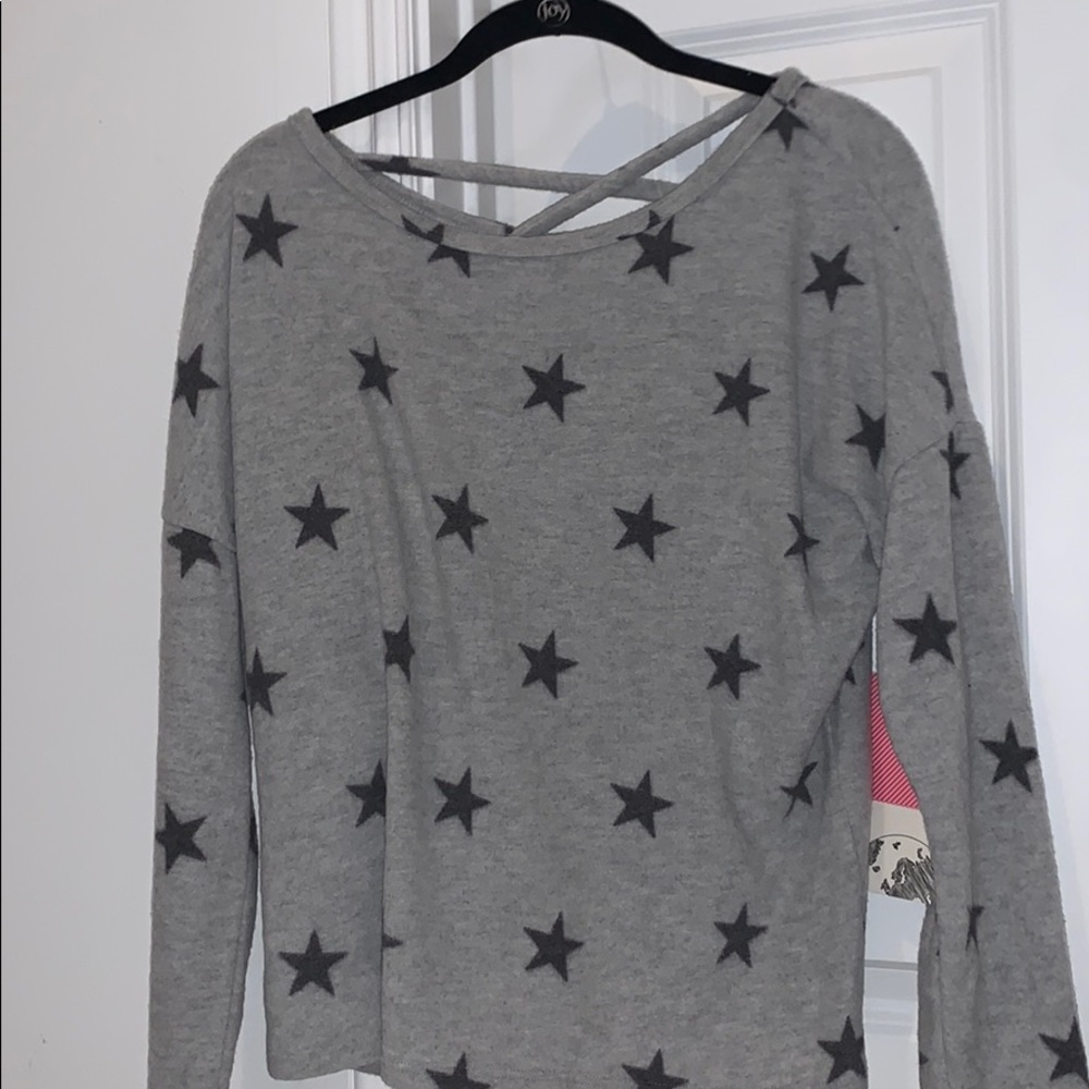 love wins long sleeve grey top with black stars